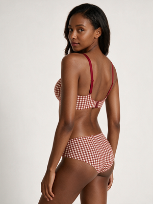 Red Gingham Airy-Lift Plunge Wireless Bra with matching panty, rear three-quarter view on deep skin model
